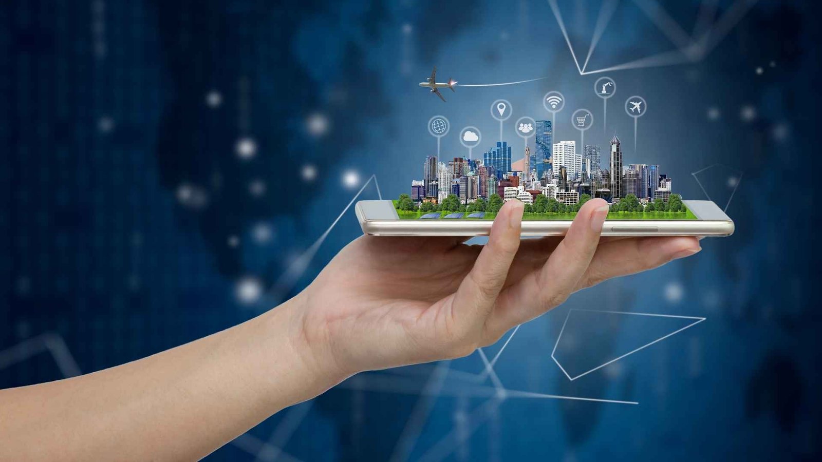 a hand holding a phone with a city and buildings